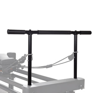 A close-up of the AeroPilates Pull-Up Bar, a black attachment with padded handles for upper body workouts, shown mounted vertically on an AeroPilates reformer frame against a white background.